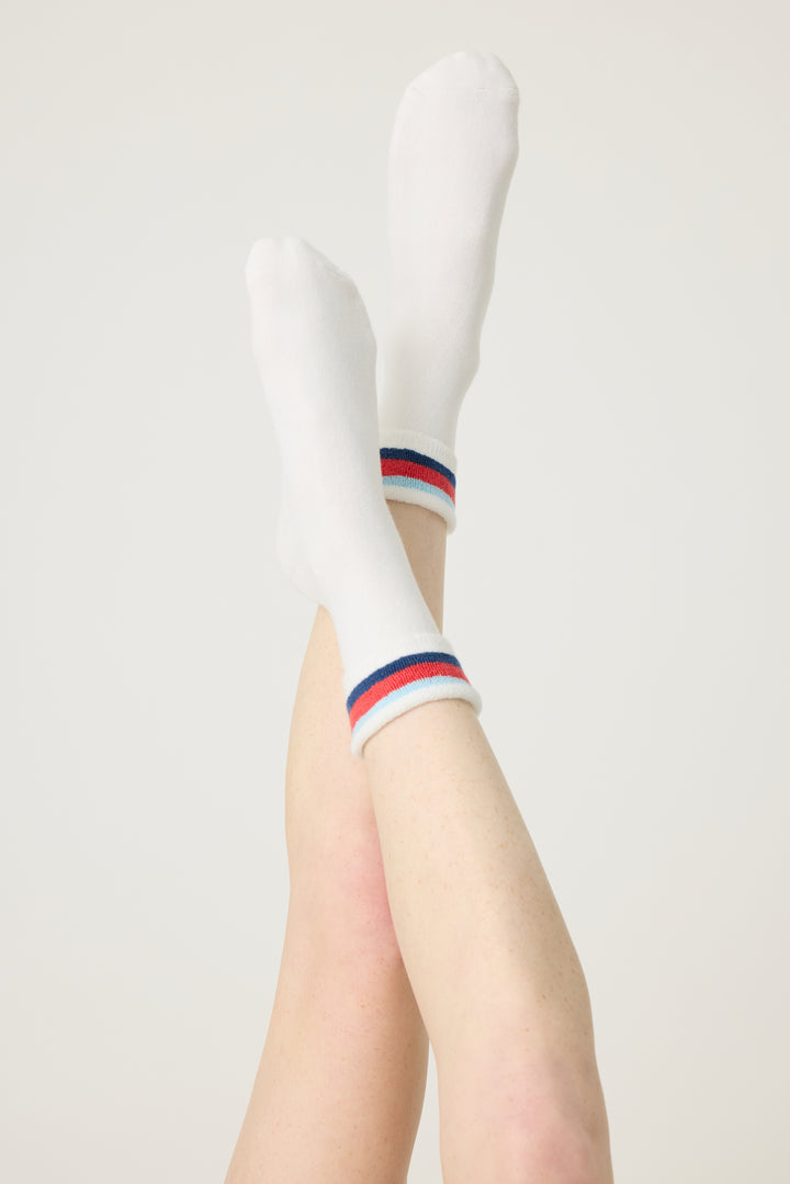 1-pack turn-cuff ankle sock. Women's & girls' terry sock in ivory with multi-stripes on cuff. Grippers on sole.