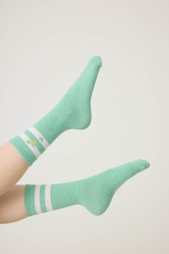 1-pack crew sock. Women's light green socks with Margarita glass design.