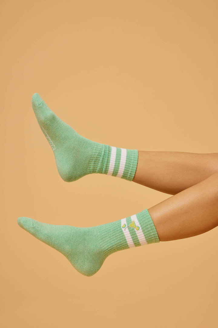 1-pack crew sock. Women's light green socks with Margarita glass design.
