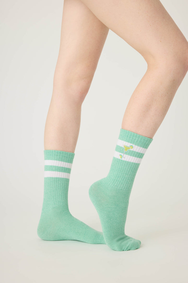 1-pack crew sock. Women's light green socks with Margarita glass design.