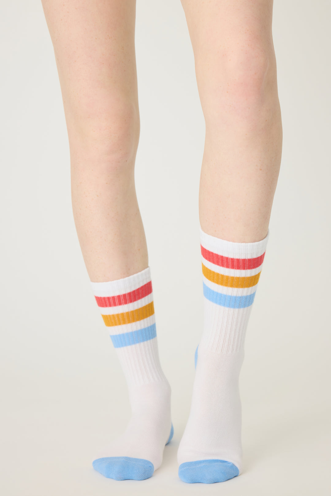 1-pack crew socks. Women's & girls' ivory socks w blue-red-gold stripes.