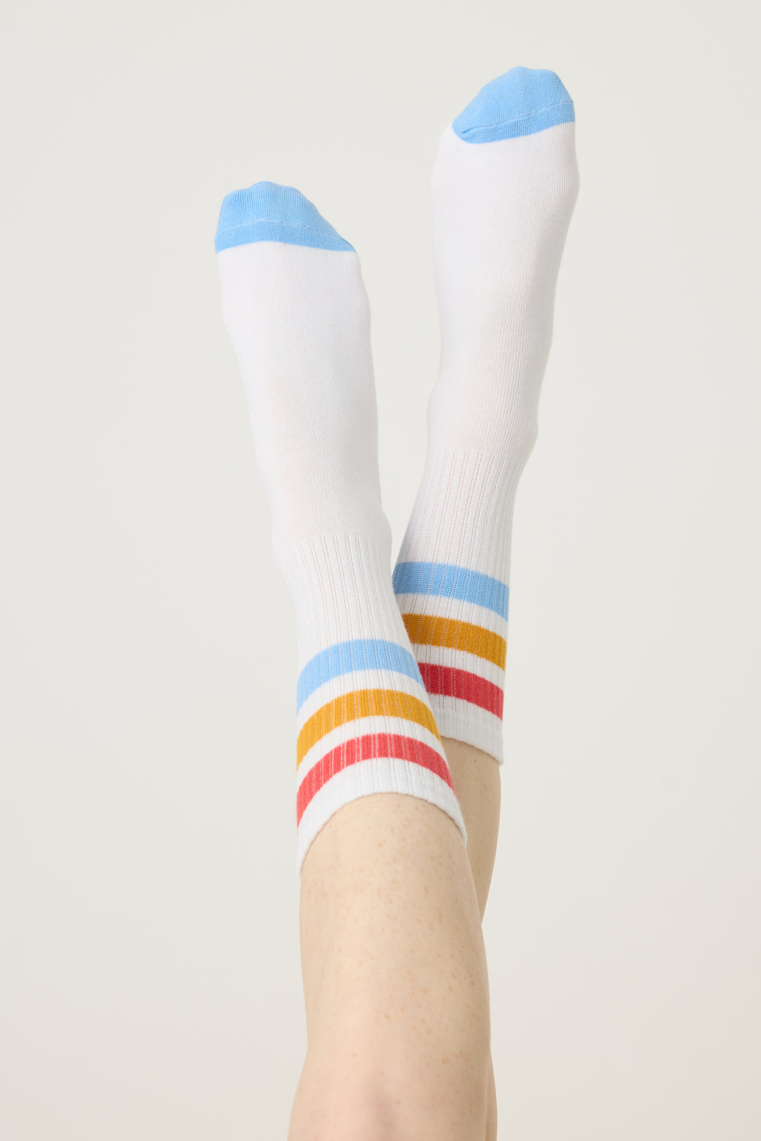 1-pack crew socks. Women's & girls' ivory socks w blue-red-gold stripes.