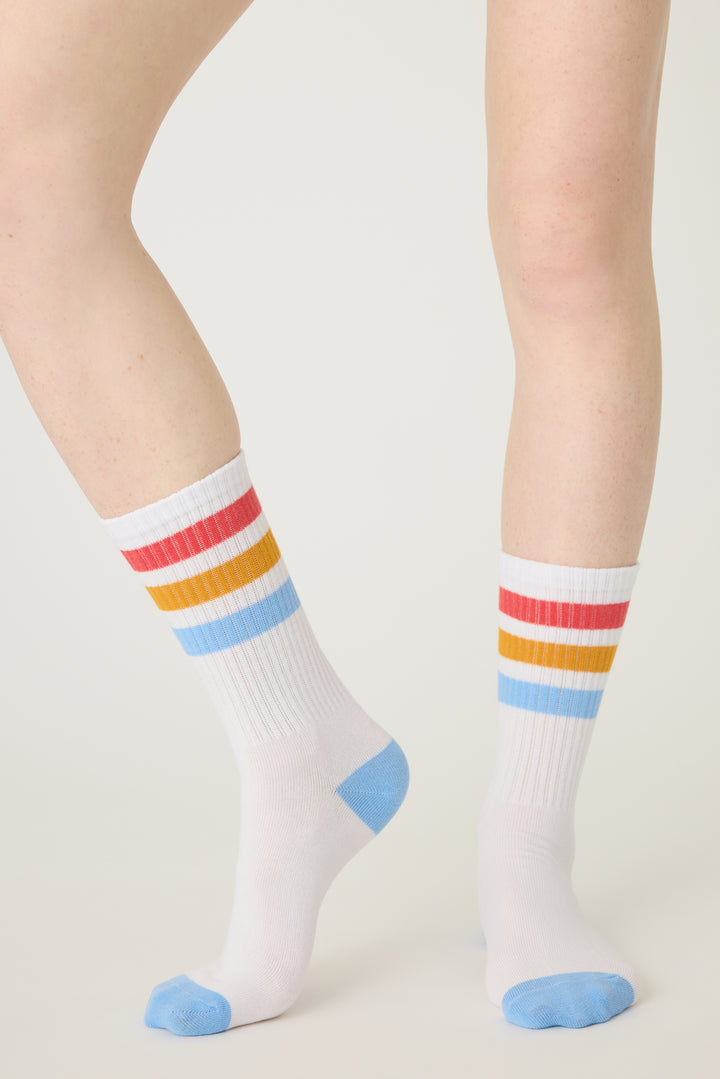 1-pack crew socks. Women's & girls' ivory socks w blue-red-gold stripes.