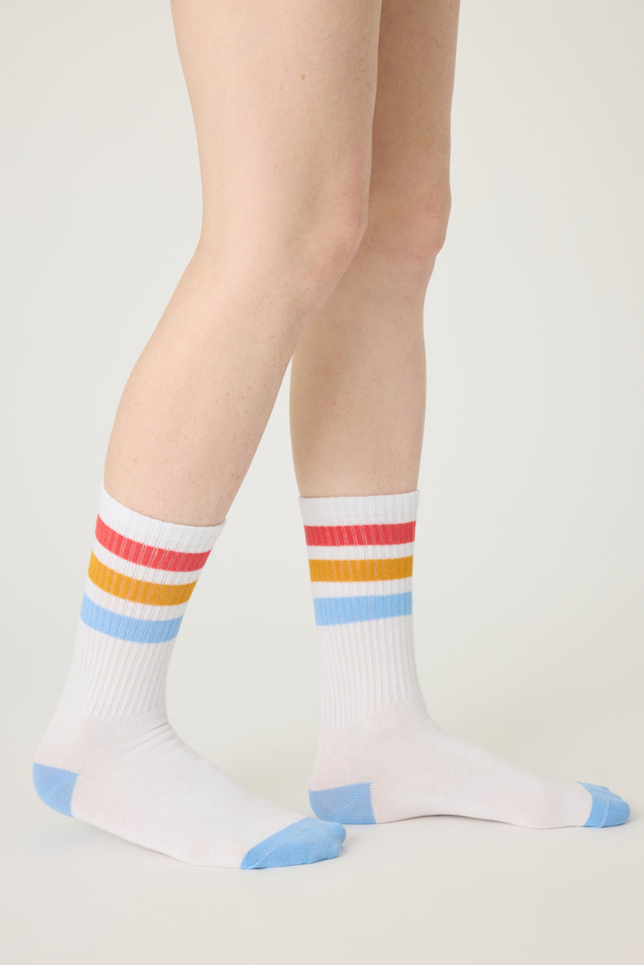 1-pack crew socks. Women's & girls' ivory socks w blue-red-gold stripes.