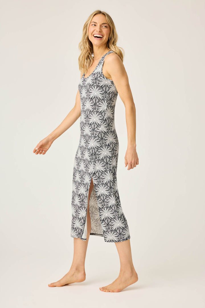 Women's black & ivory palm print midi-dress in modal. Semi-fitted with side slit hem.