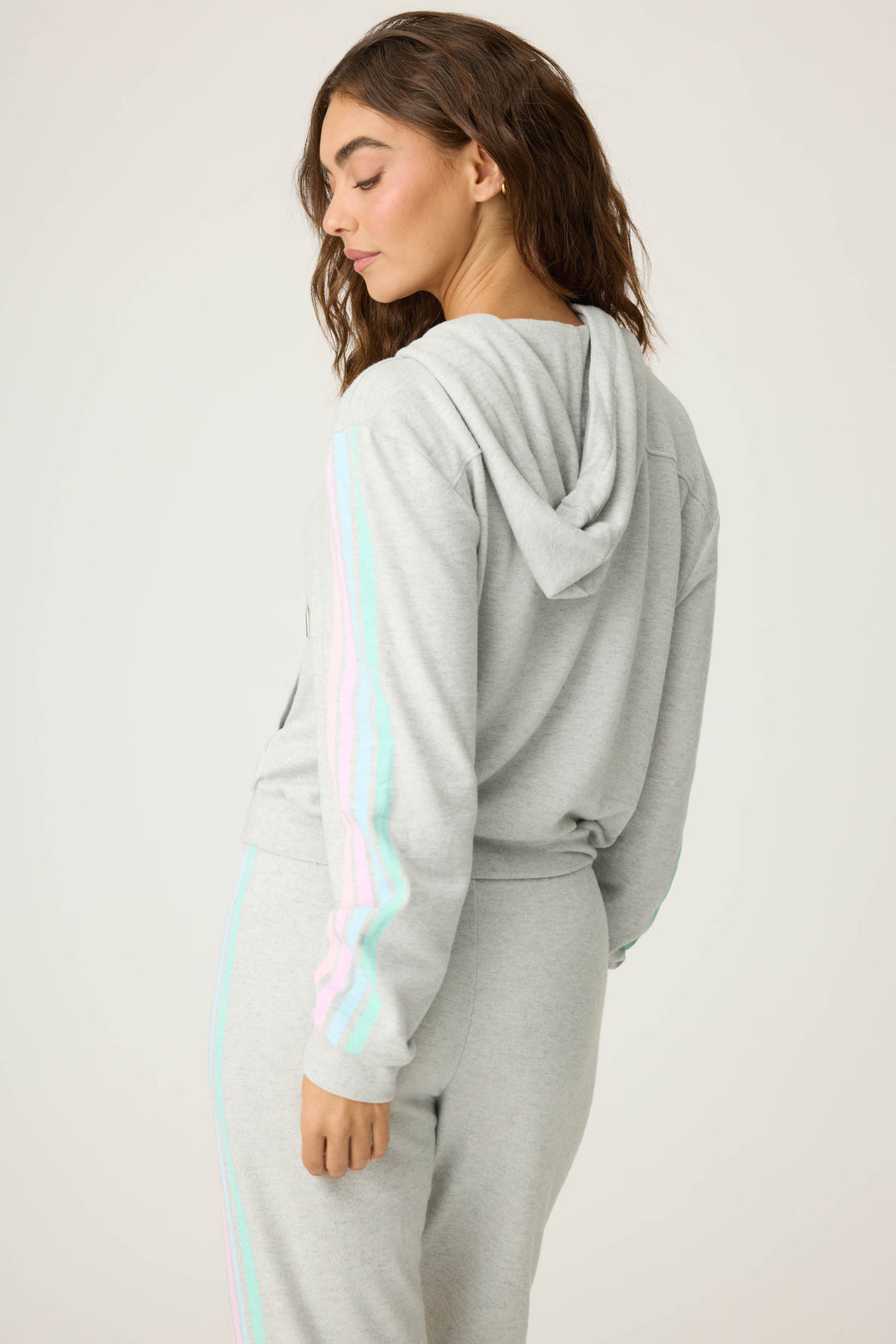 Women's grey zip hoody with pastel sleeve stripes. Front pockets.