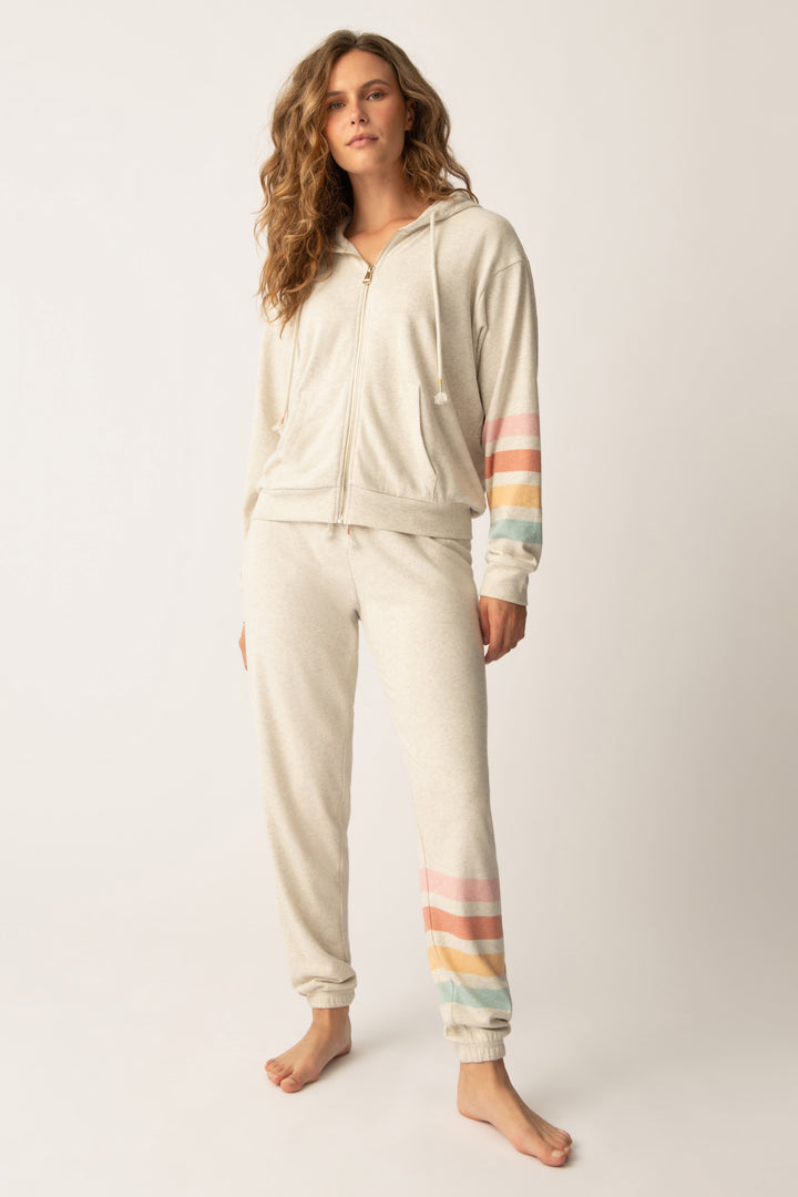 Women's zip hoody in oatmeal with graphic stripe print on sleeve. Lower front pockets.