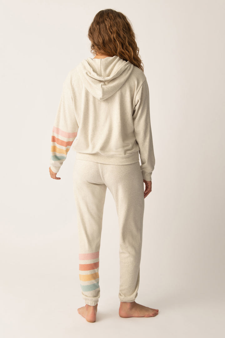 Women's zip hoody in oatmeal with graphic stripe print on sleeve. Lower front pockets.