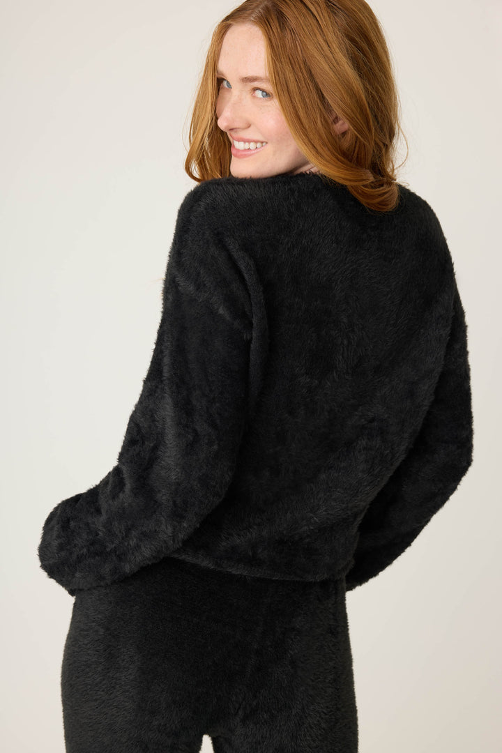 Women's black feather knit long sleeve top.