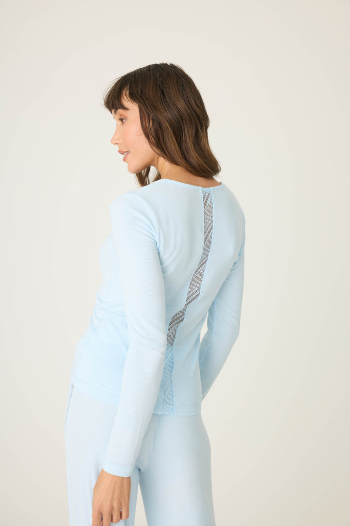 Women's fitted blue long sleeve top in micro-rib knit. With lace inset neckline & back detail.
