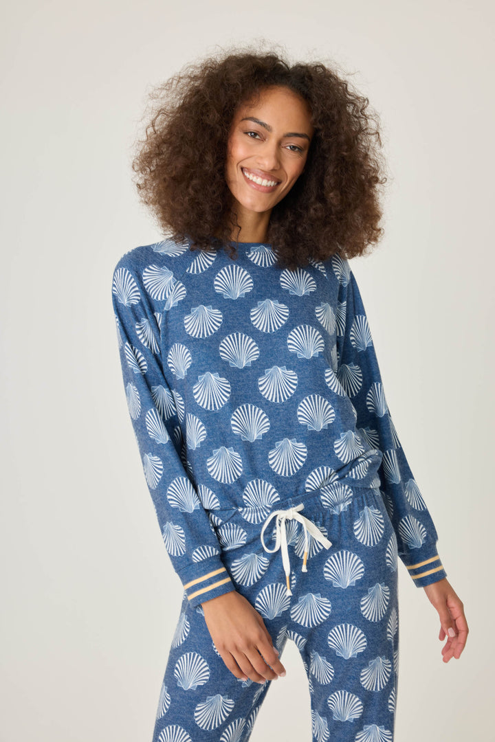 Navy shell-printed lounge top for women. Long sleeve with banded hem & gold striped sleeve cuffs.