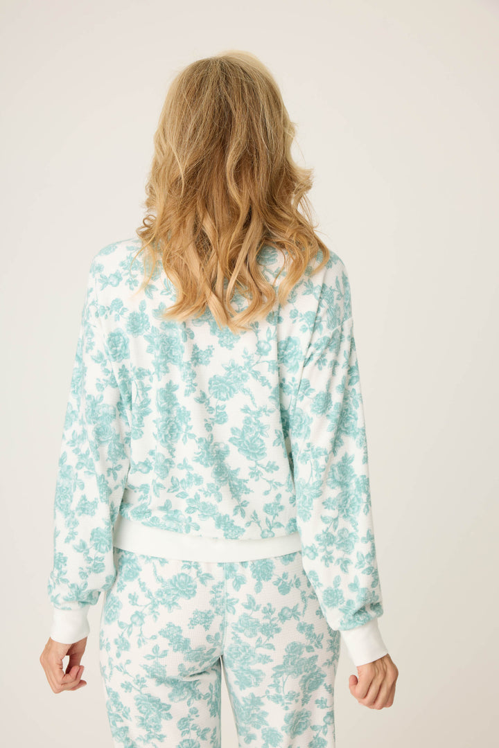 Women's white pj pullover long sleeve with jade floral pattern.