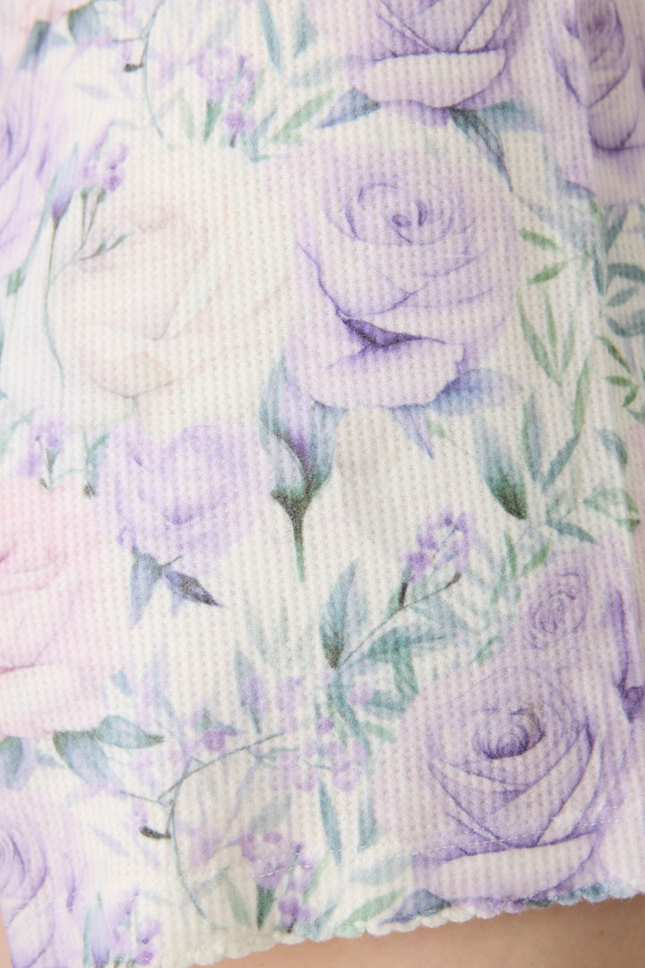 Women's lilac rose pattern collared pj top.