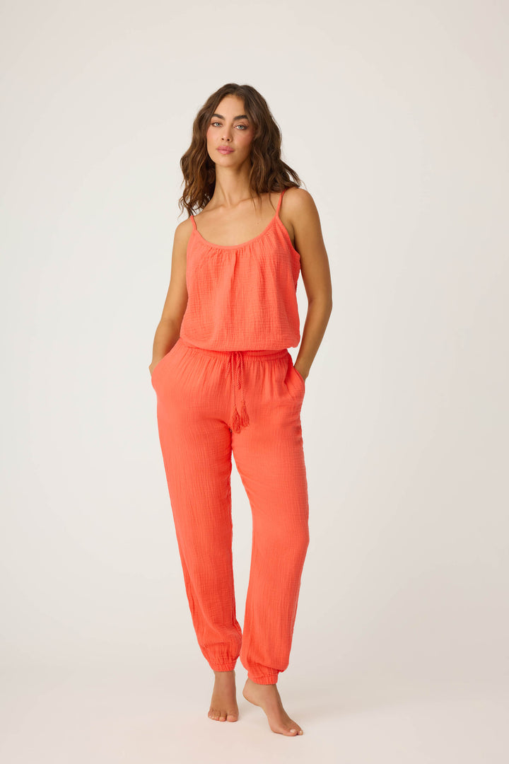 Women's red-orange lounge set top & pant in cotton woven gauze. Strappy camisole top & banded jogger styles.