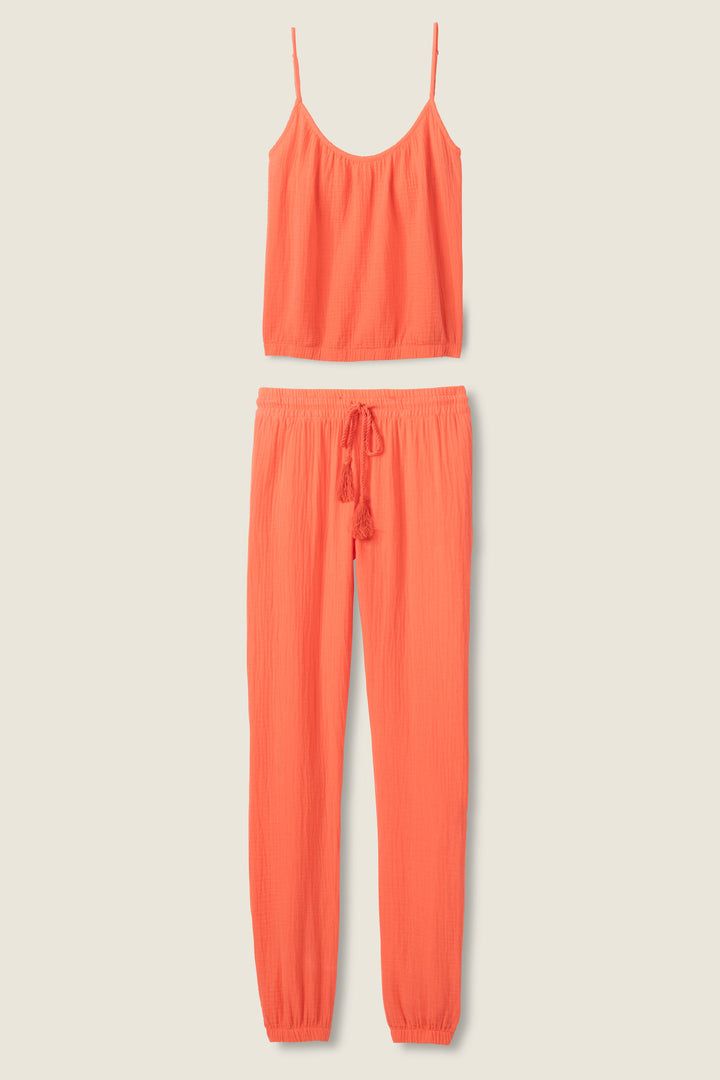 Women's red-orange lounge set top & pant in cotton woven gauze. Strappy camisole top & banded jogger styles.