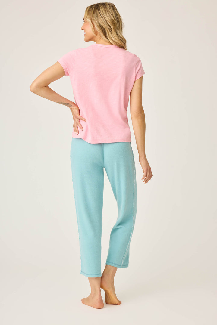 Women's lounge set of green crop lounge pant with pink Aloha print short sleeve t-shirt.