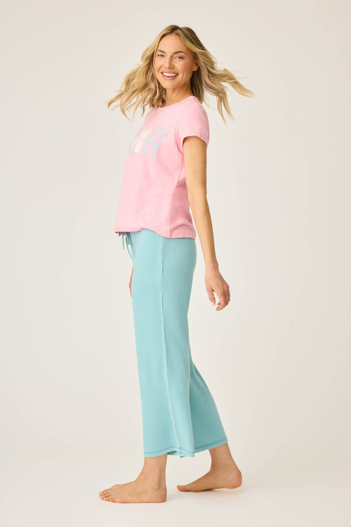 Women's lounge set of green crop lounge pant with pink Aloha print short sleeve t-shirt.