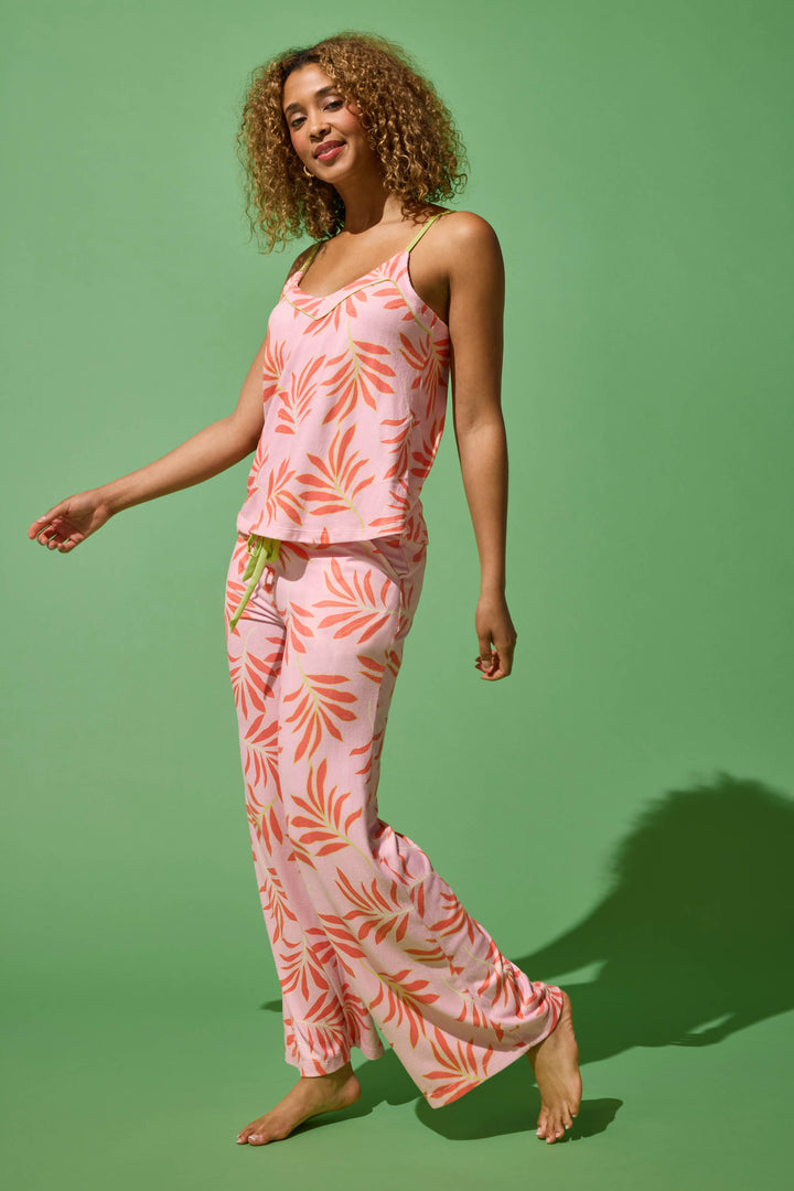 Women's pink & orange tropical print lounge set. Camisole top with adjustable straps. Open leg pant with tie waist.