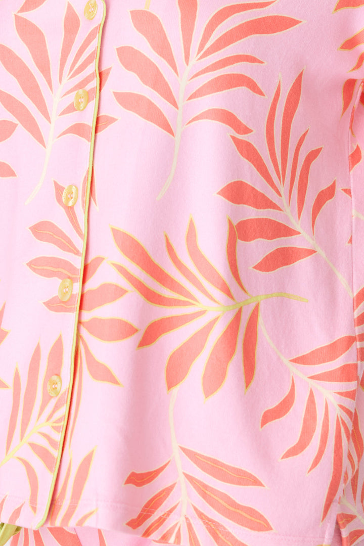 Women's pink & orange tropical print pajama short set. Short sleeve button-front top with neon green piping. Short with tie waist.