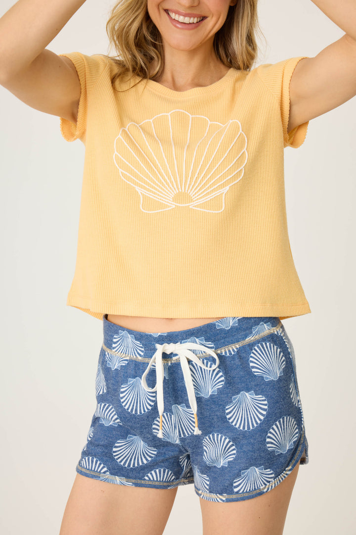 Women's lounge set with yellow short sleeve shell-embroidered t-shirt & navy shell printed lounge short.