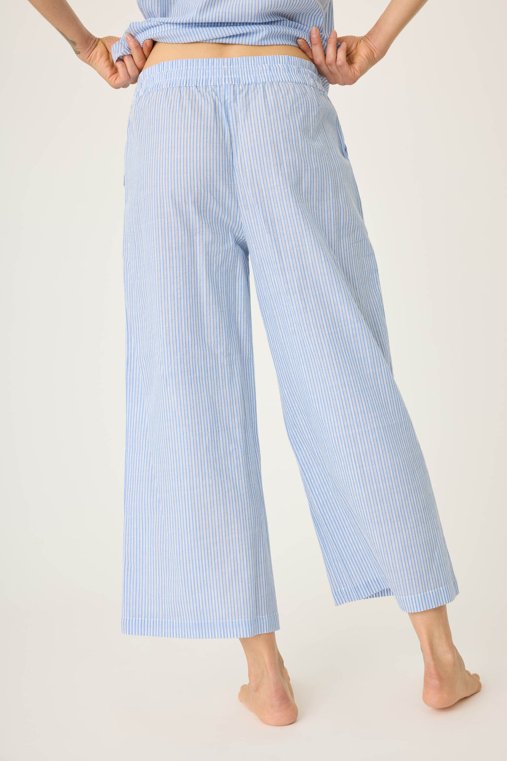 Women's blue & white striped cotton crop pant with pockets. With waist tassle cord detail. Lightweight woven.