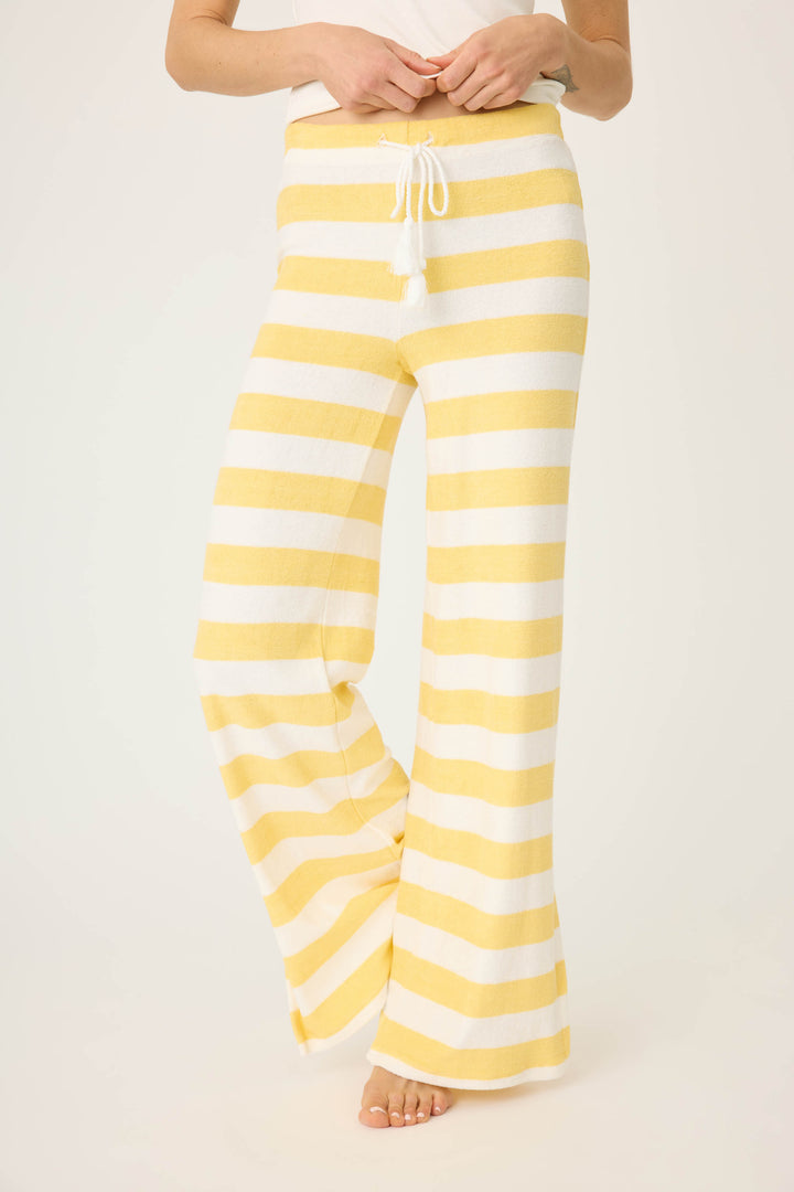 Ivory-yellow terry stripe pant for women. Wide leg with side slits. Back patch pocket with tie waist.