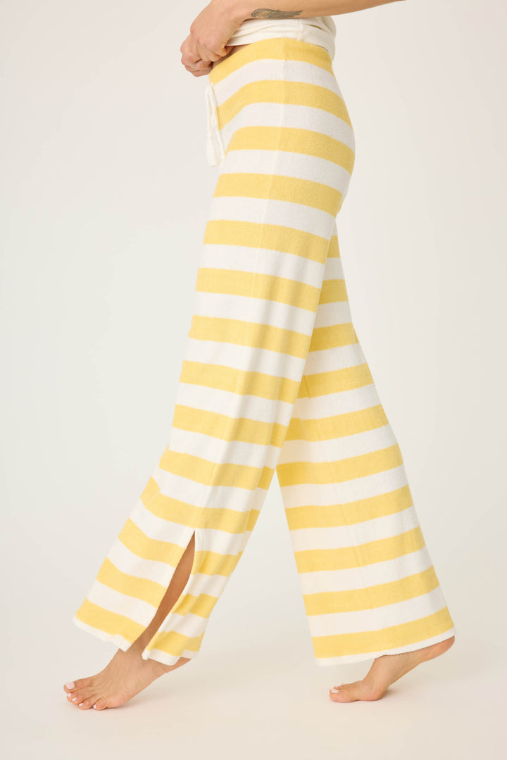 Ivory-yellow terry stripe pant for women. Wide leg with side slits. Back patch pocket with tie waist.