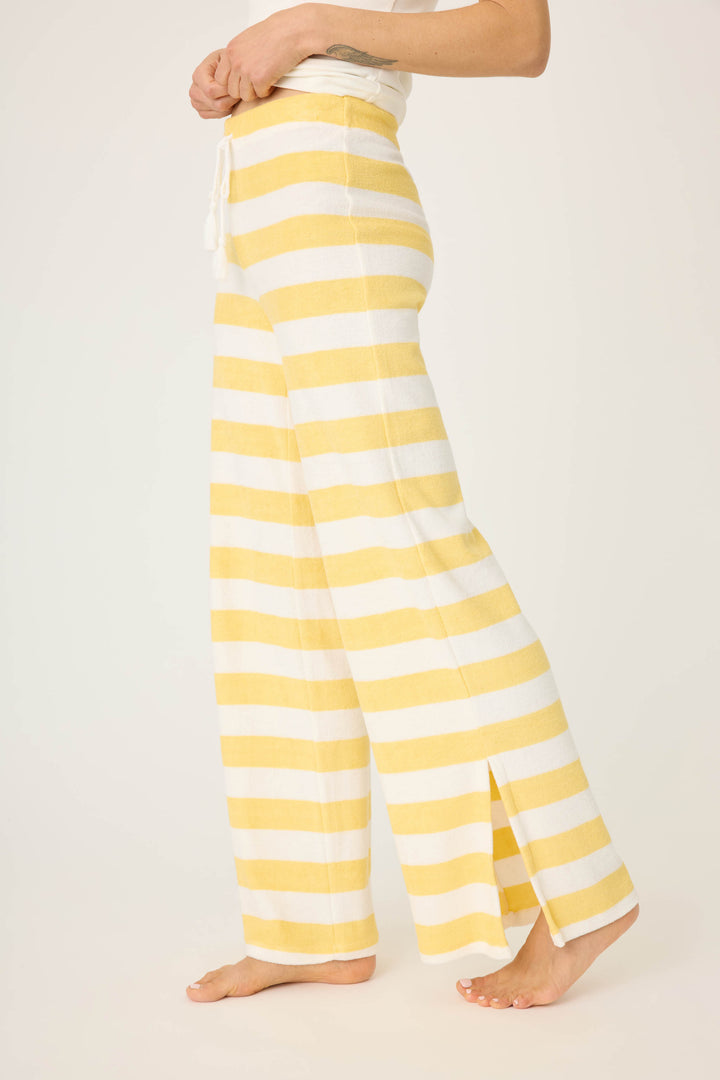 Ivory-yellow terry stripe pant for women. Wide leg with side slits. Back patch pocket with tie waist.