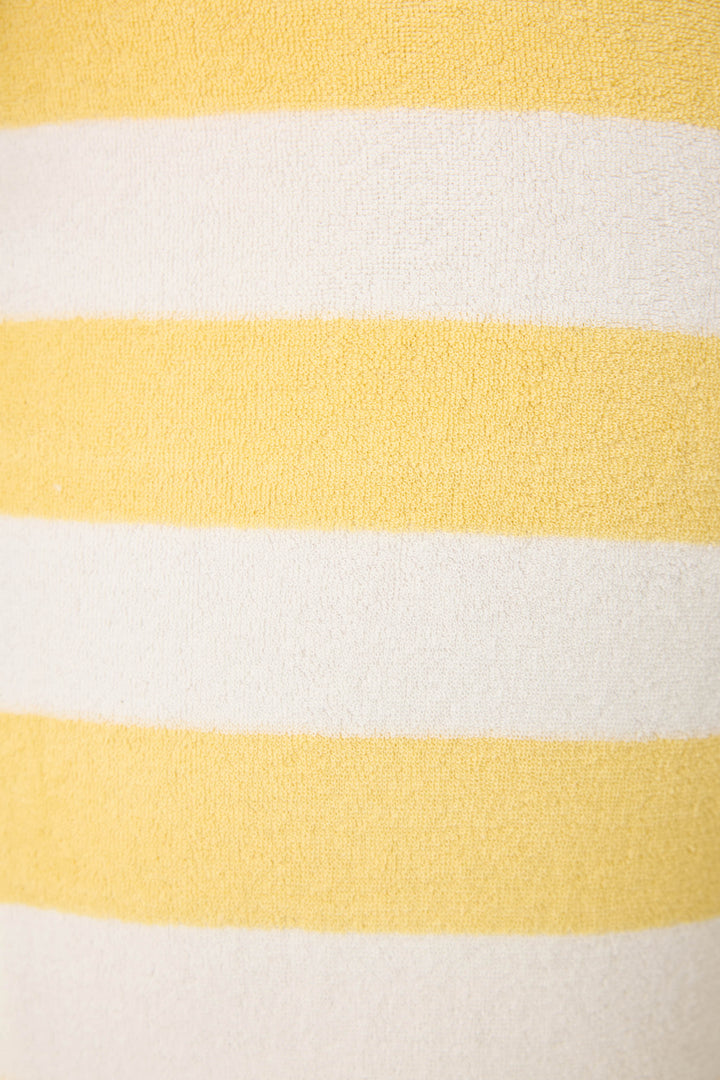 Ivory-yellow terry stripe pant for women. Wide leg with side slits. Back patch pocket with tie waist.