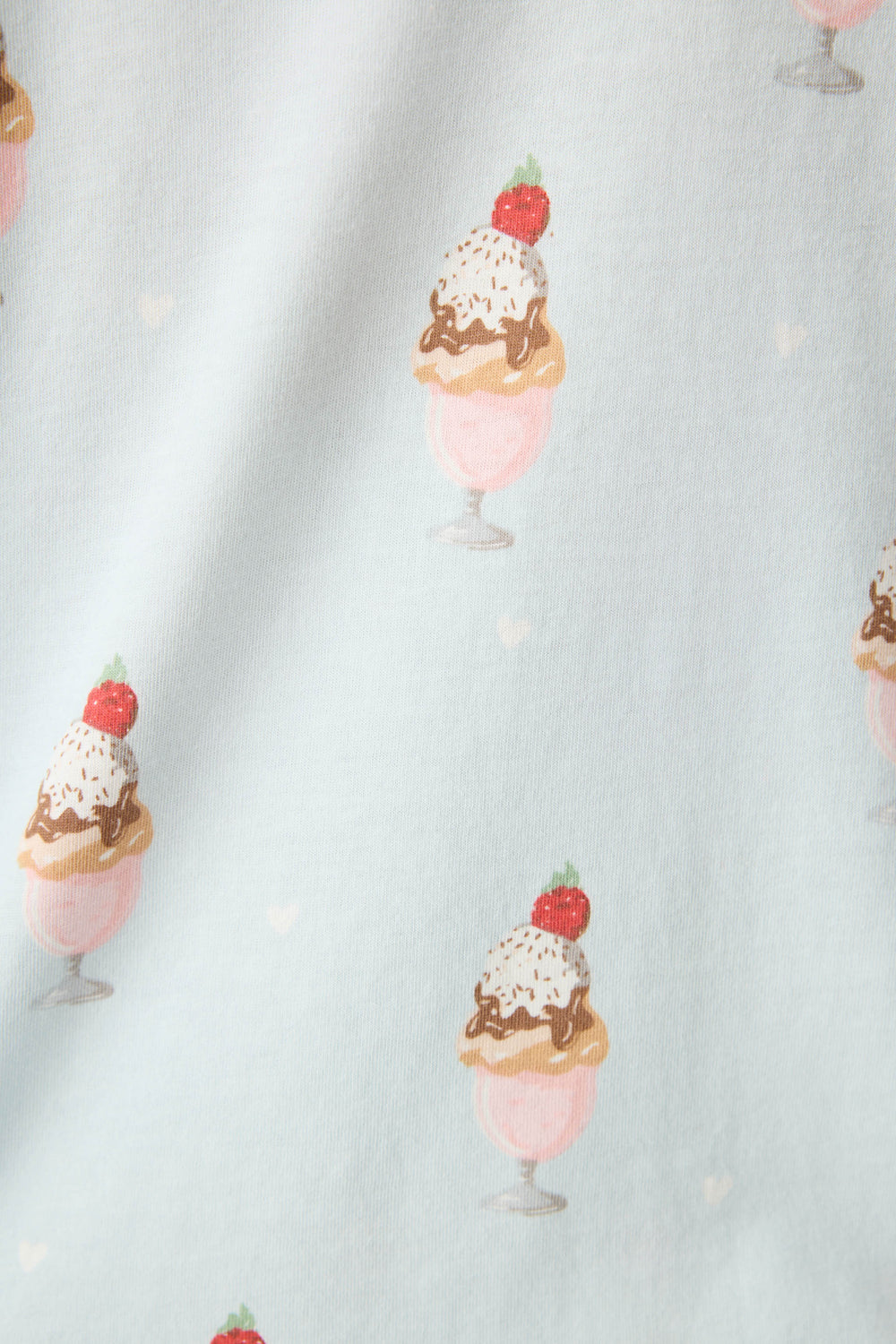 Women's light blue ice cream printed pajama set tank top & tie-waist pajama pant.