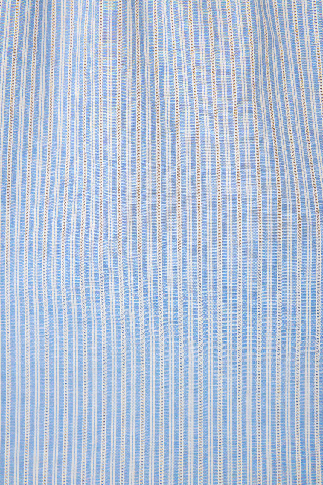 Women's blue & white striped cotton lounge set. Camisole top with ladder stitching at neckline, crop pant with pockets & tassel tie waist.