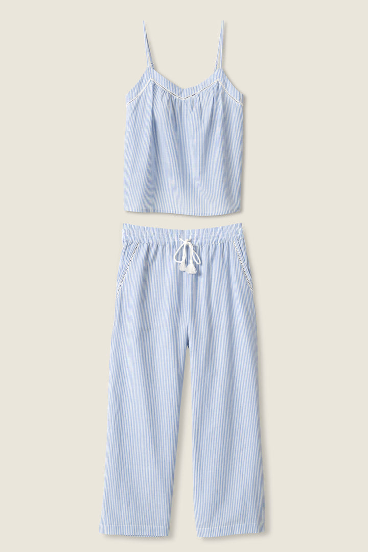 Women's blue & white striped cotton lounge set. Camisole top with ladder stitching at neckline, crop pant with pockets & tassel tie waist.