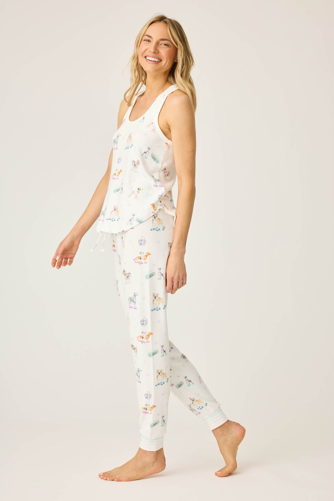 Women's ivory dogs & rollerskates print lounge set. Printed tank top & jammie pant.