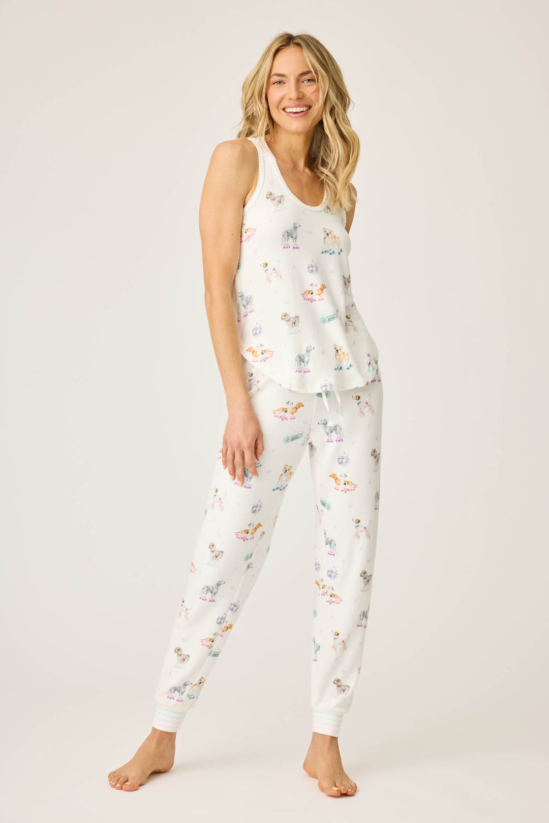 Women's ivory dogs & rollerskates print lounge set. Printed tank top & jammie pant.