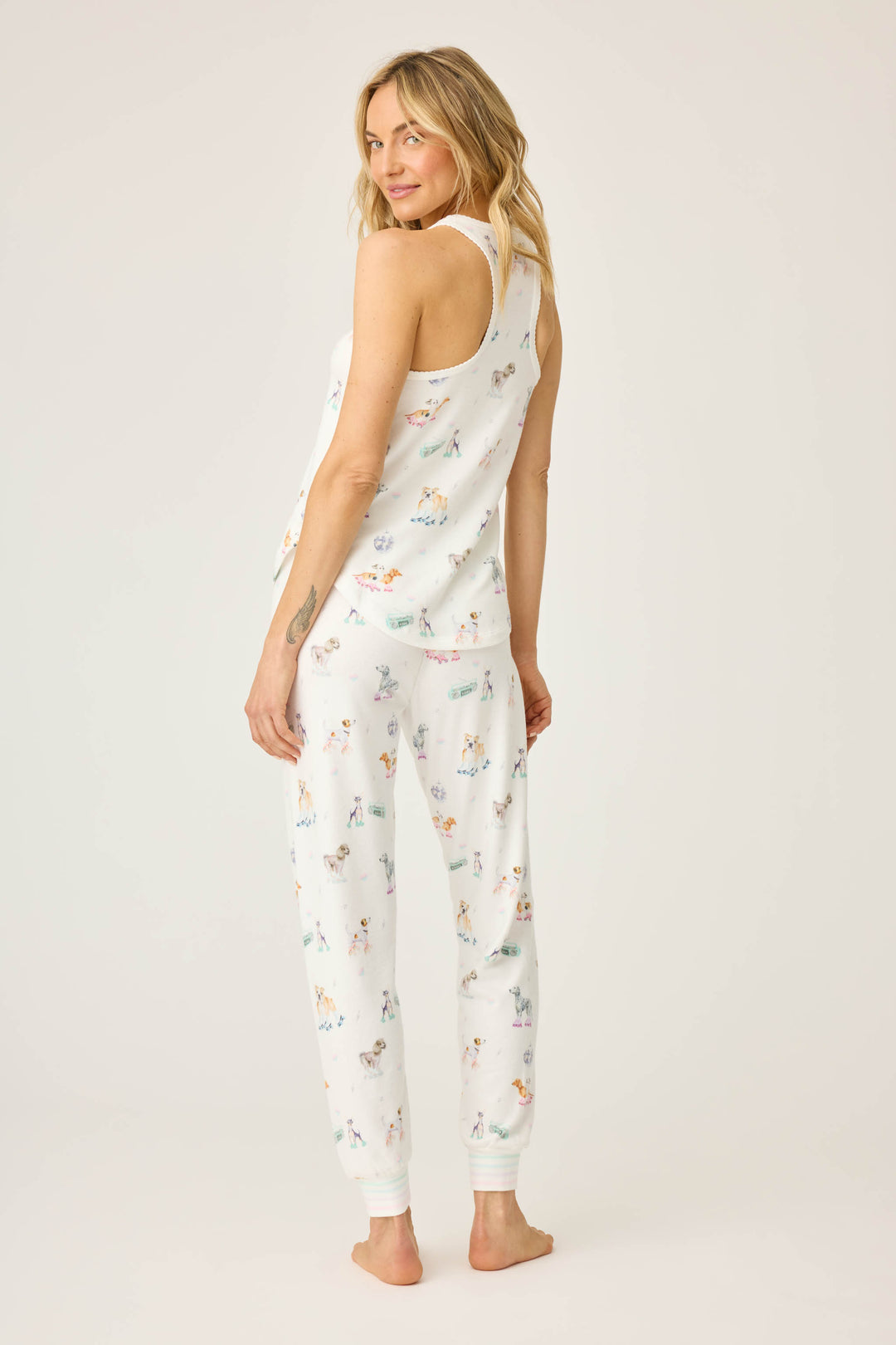 Women's ivory dogs & rollerskates print lounge set. Printed tank top & jammie pant.