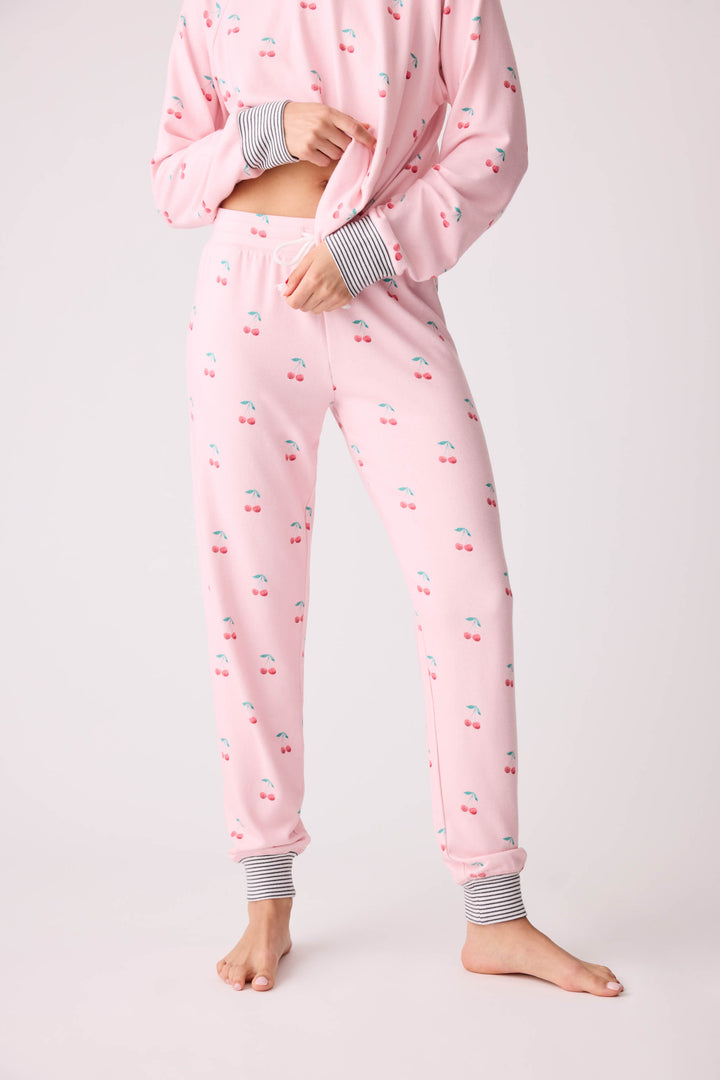 Women's pink banded pj pant with cherry pattern.