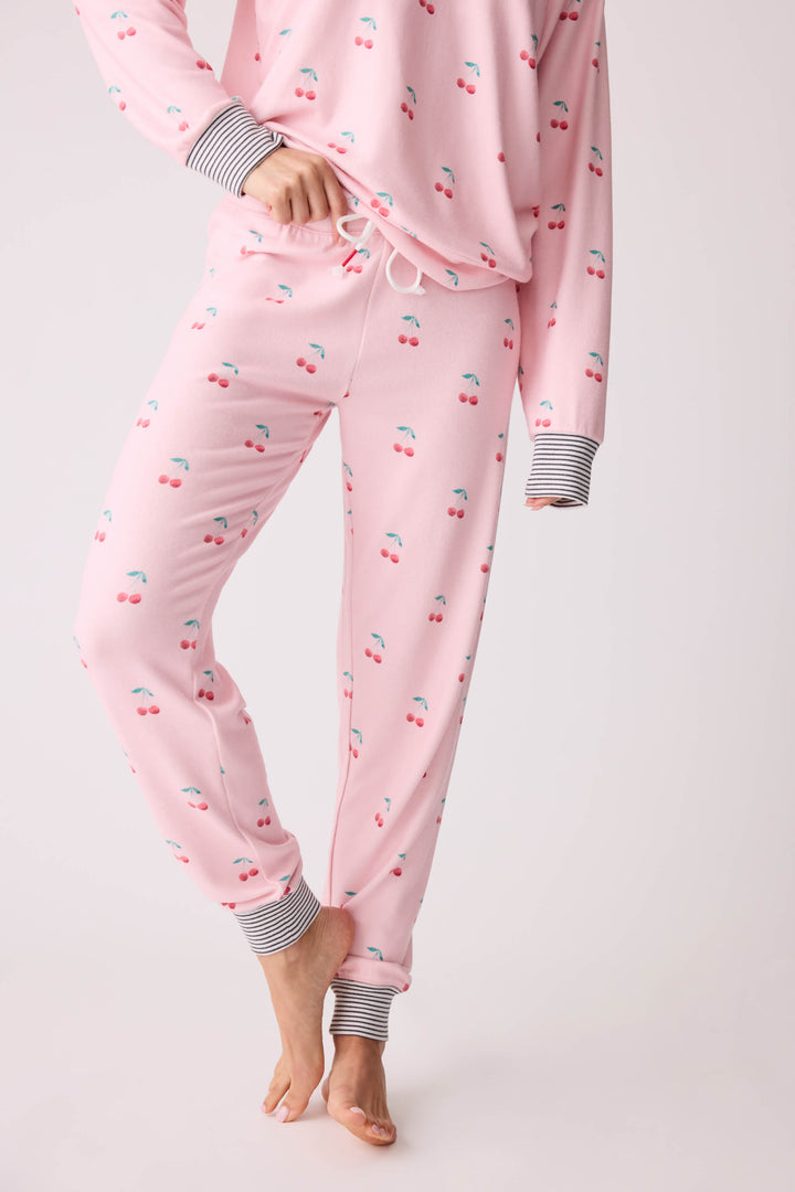 Women's pink banded pj pant with cherry pattern.