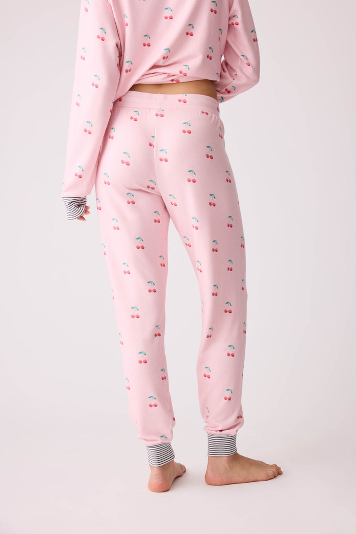 Women's pink banded pj pant with cherry pattern.