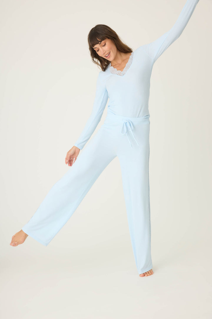 Women's semi-fitted blue lounge pant in micro-rib knit. With lace inset at side seams. Straight leg & tie-waist.
