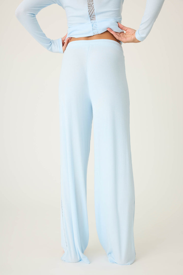 Women's semi-fitted blue lounge pant in micro-rib knit. With lace inset at side seams. Straight leg & tie-waist.