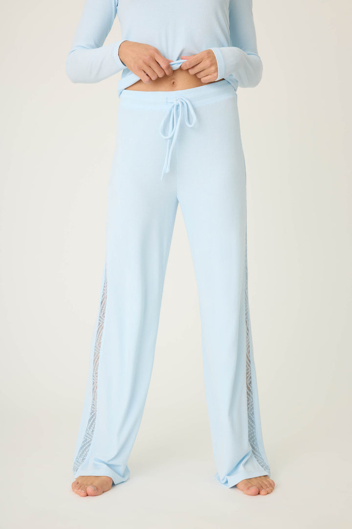 Women's semi-fitted blue lounge pant in micro-rib knit. With lace inset at side seams. Straight leg & tie-waist.