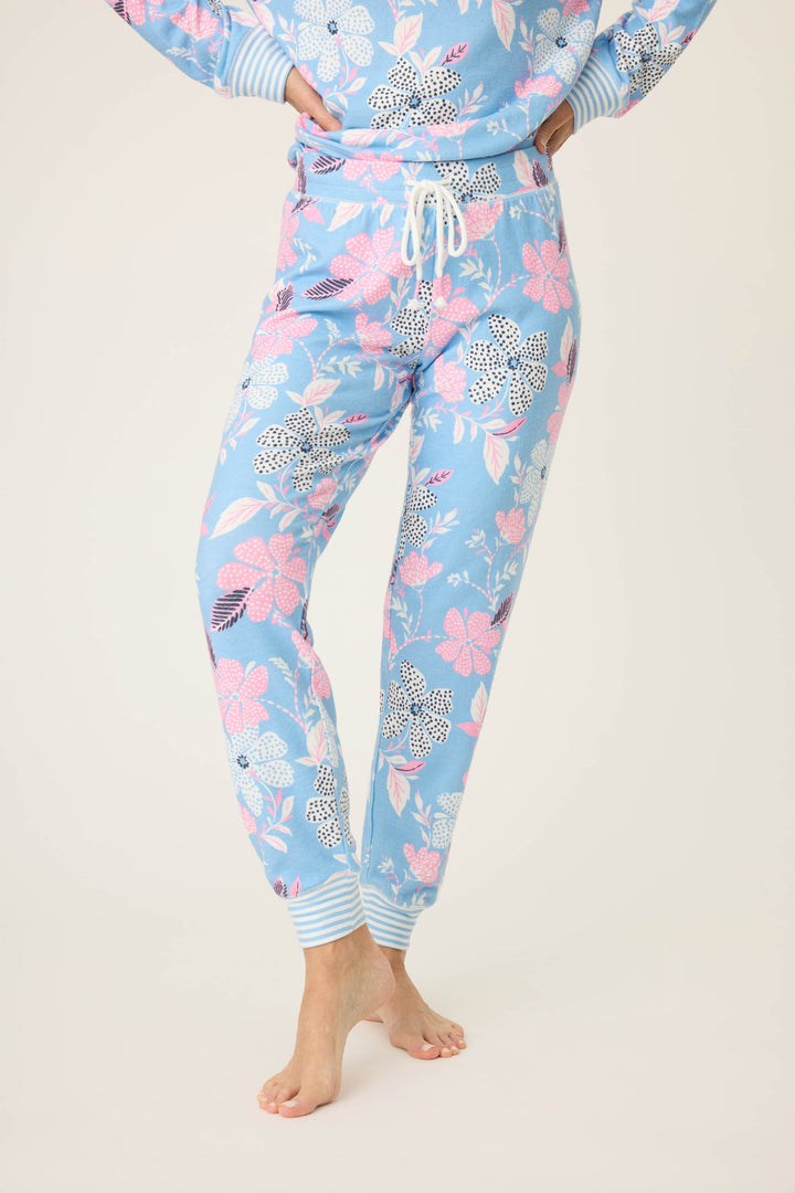 Women's ivory-blue-pink winter floral pj jogger with striped cuffs. Tie waist with faux 3-button fly.