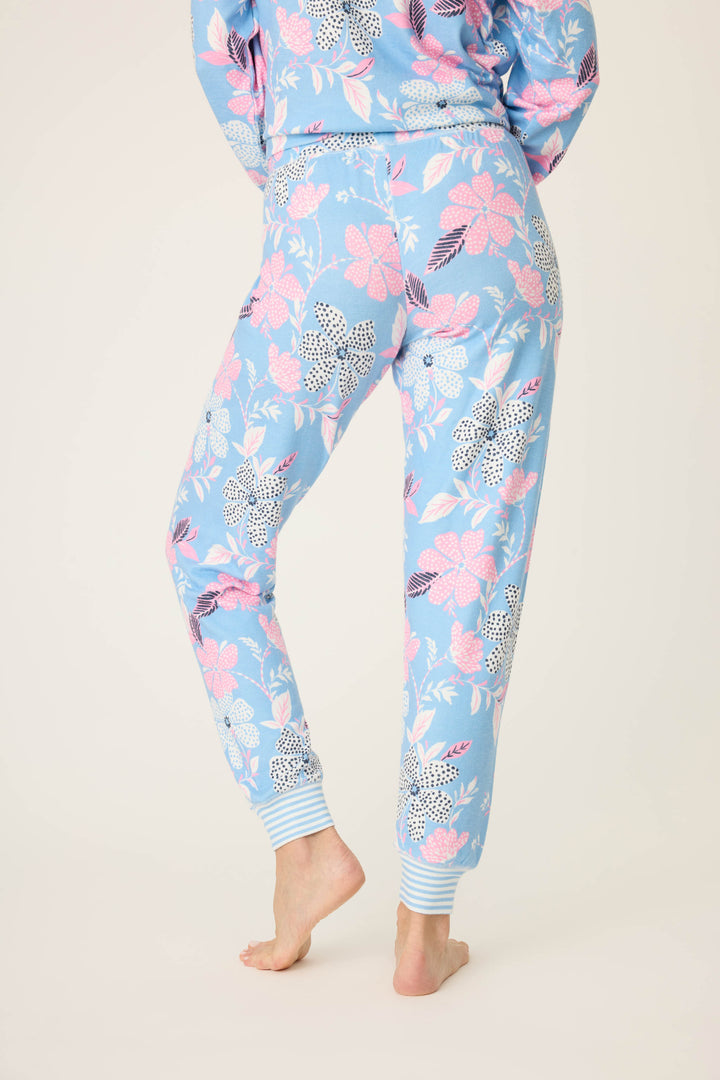 Women's ivory-blue-pink winter floral pj jogger with striped cuffs. Tie waist with faux 3-button fly.