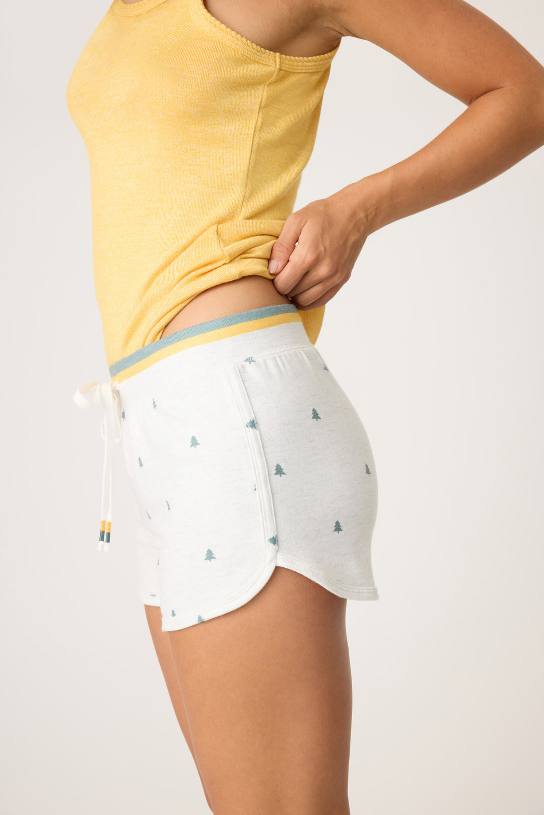 Women's heather grey sleep short with mini tree print. Striped waistband.