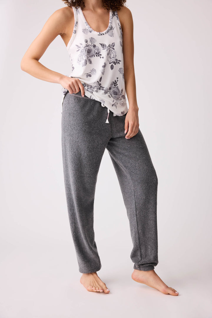 Women's dark banded pj pant with rose embroidery on hip.