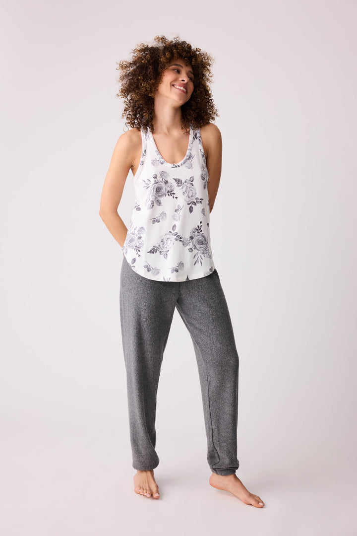Women's dark banded pj pant with rose embroidery on hip.