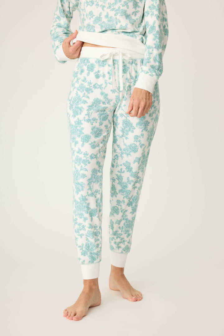 Women's white banded pj pant with jade floral pattern.