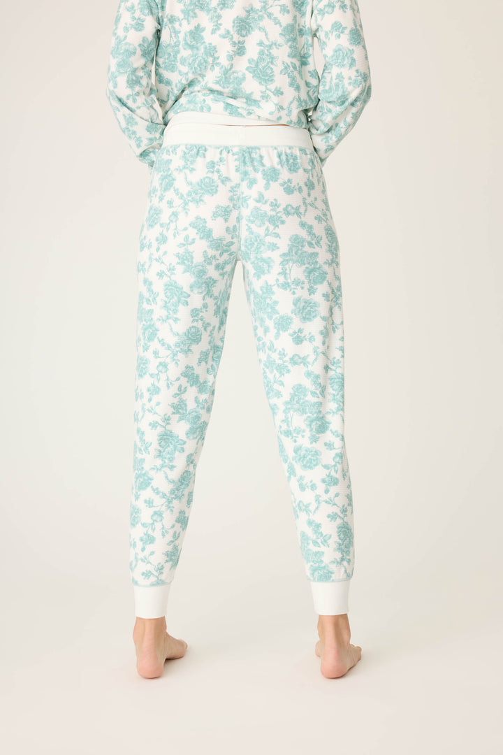 Women's white banded pj pant with jade floral pattern.