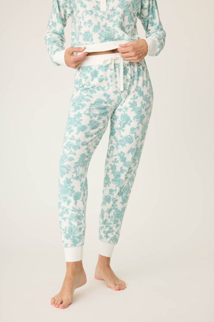 Women's white banded pj pant with jade floral pattern.