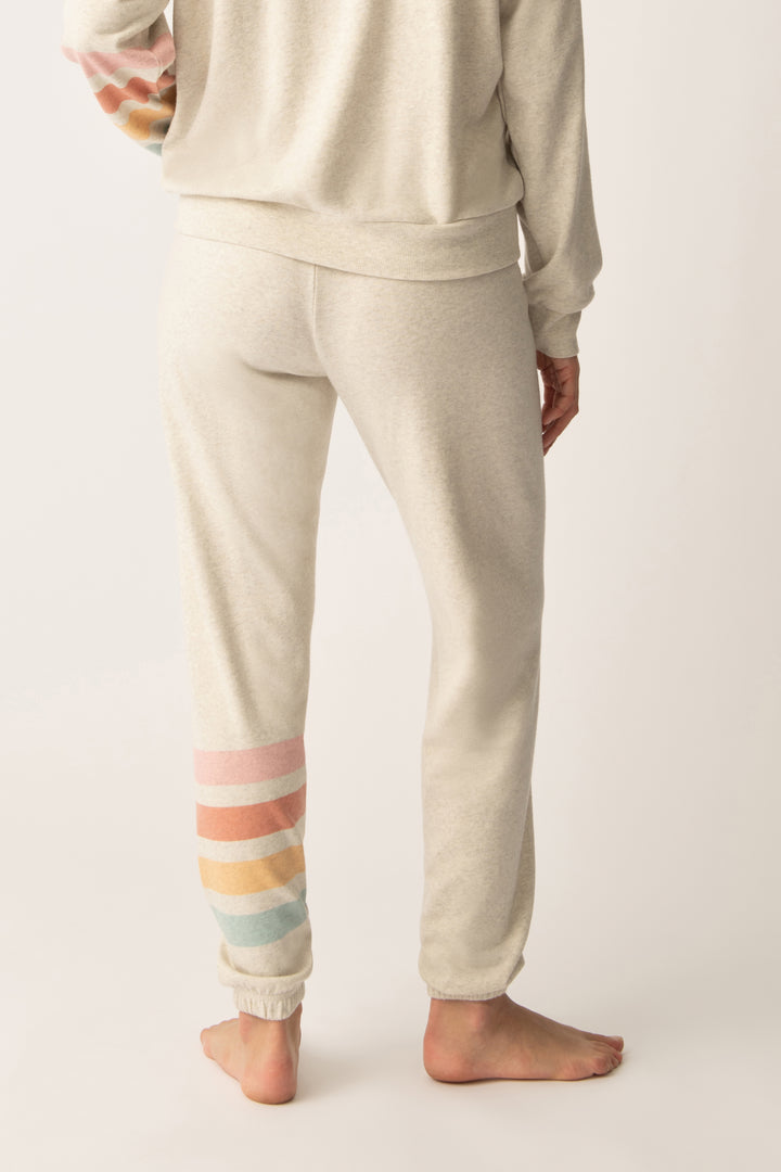 Women's jogger pant in oatmeal with graphic stripe print on leg. Tie waist.